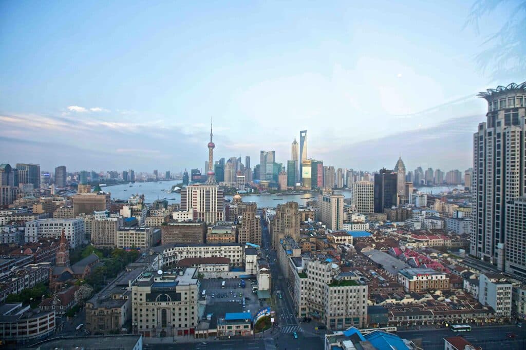 View of the city of Shanghai and its financial district under a sunny sky