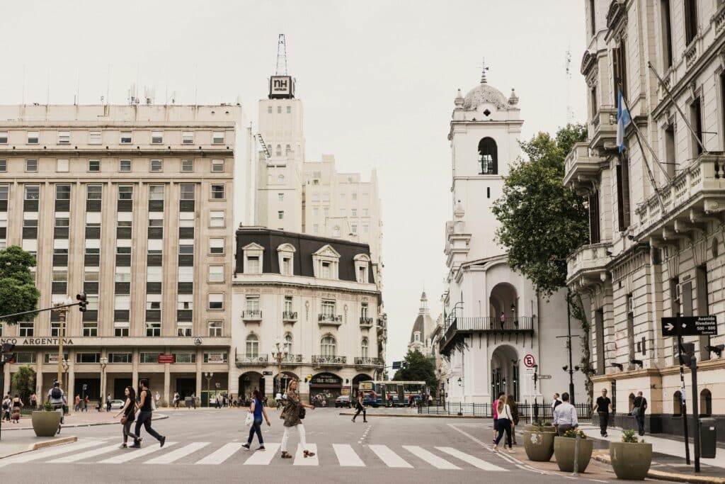 Trendy street in Buenos Aires, Argentina. Few people are in the street and the photo is not very colourful, the colours are very white.